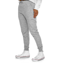 Load image into Gallery viewer, Staying active is no problem when you’ve got a stylish pair of premium-quality joggers like these. The back pocket is customizable and has two spacious pockets on the sides. The super comfy, medium-heavy fabric of the joggers also makes a great surface for any printed design.
