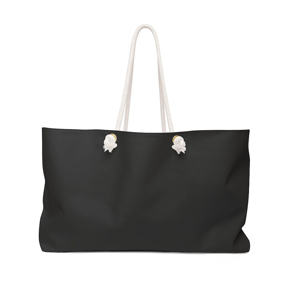 Our oversized Weekender Tote is perfect for your weekend at the beach or in town. The wide-mouthed, durable bag holds a generous amount of personal items and is easily held by its thick rope handles.